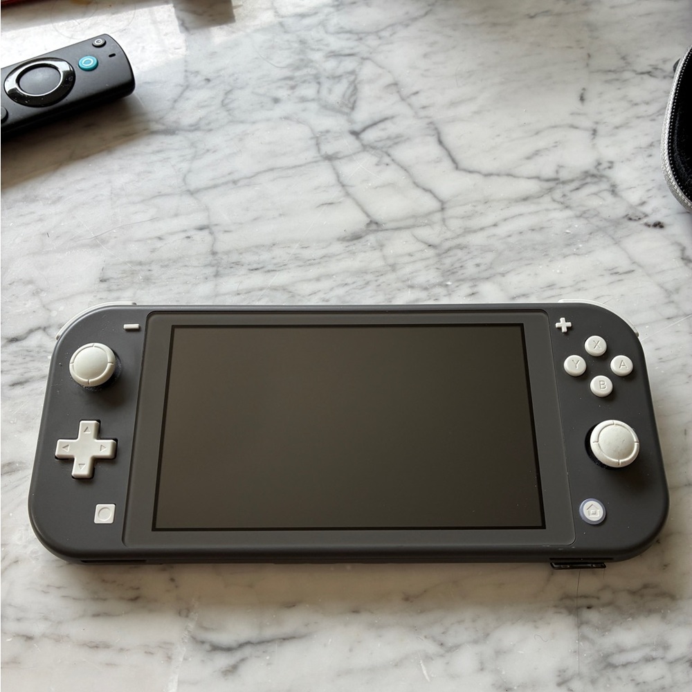 Nintendo Switch Lite Console w/ memory card and 2 games